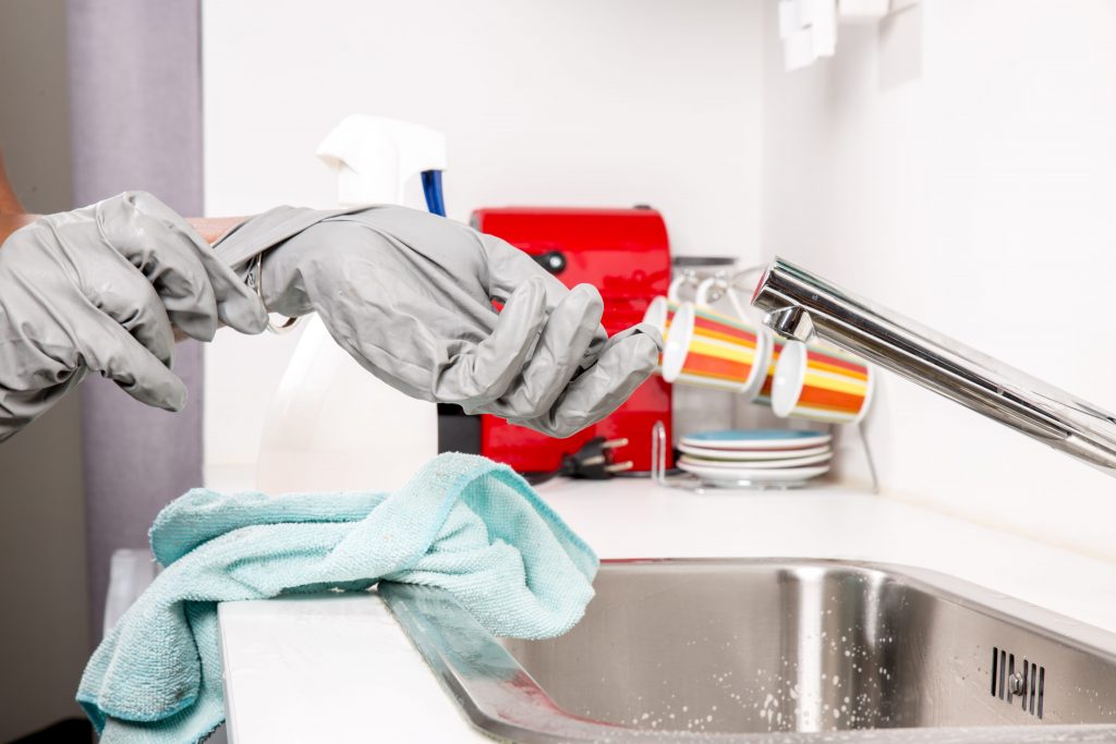 remove a kitchen sink flange